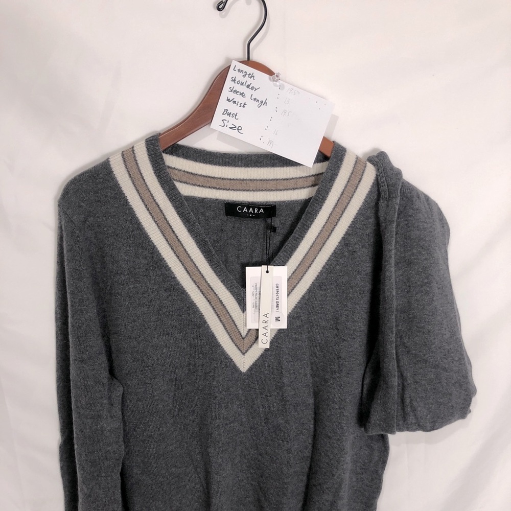 Gray V-shaped sweater